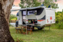 Kimberley Kampers Kruiser E Class luxury caravan exterior awning campsite styled 1200px