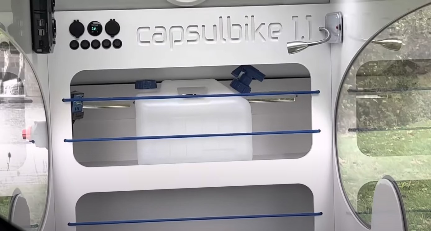 capsulbike the e bike trailer that has everything including kitchen and shower 14