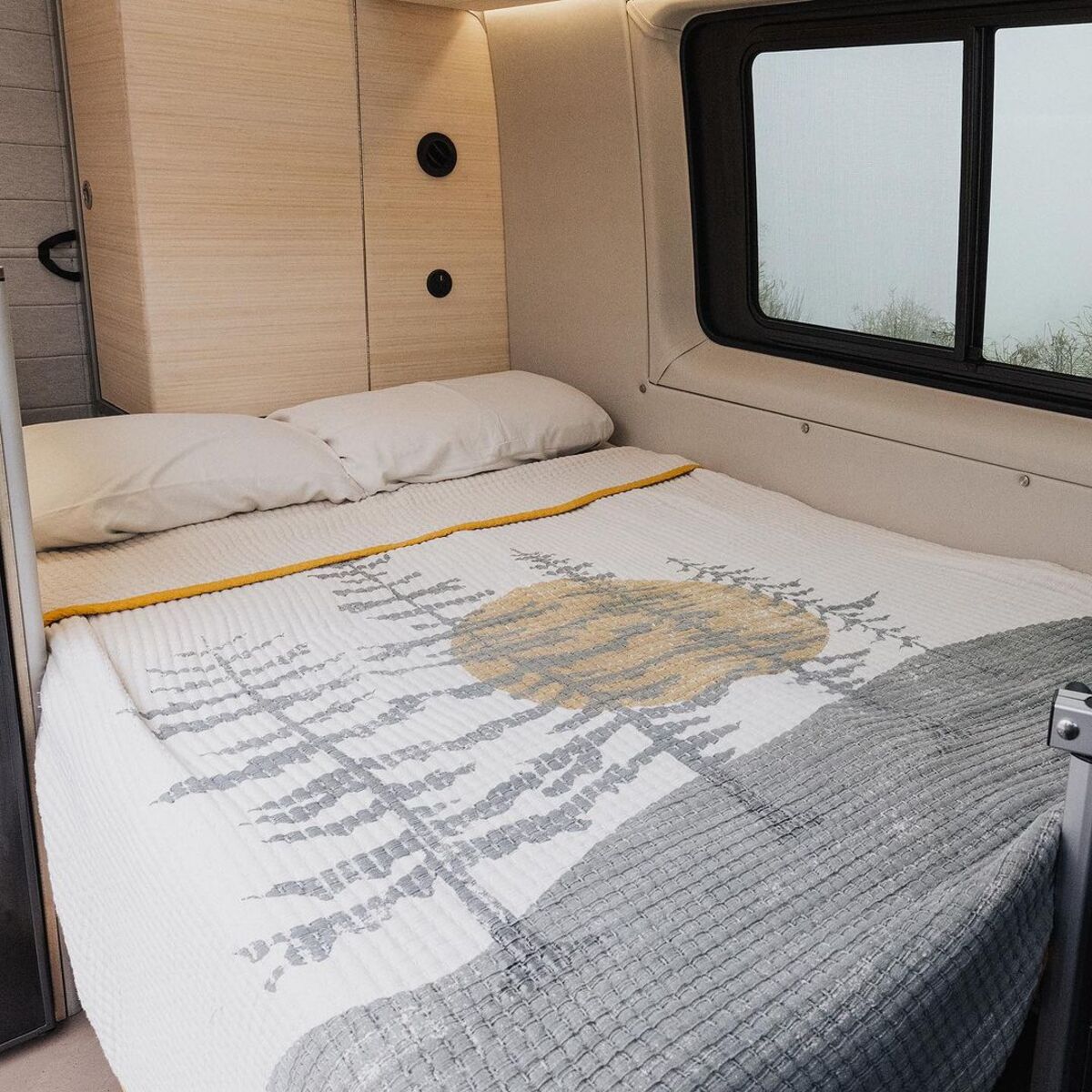 the nook van conversion offers spa bathroom and garage hidden kitchen and comfy lounge 14