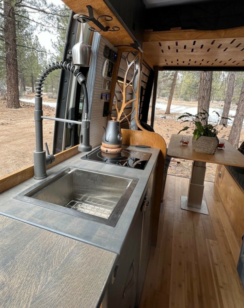 this luxurious big bear vans camper conversion has an elevator bed and rooftop decking 10
