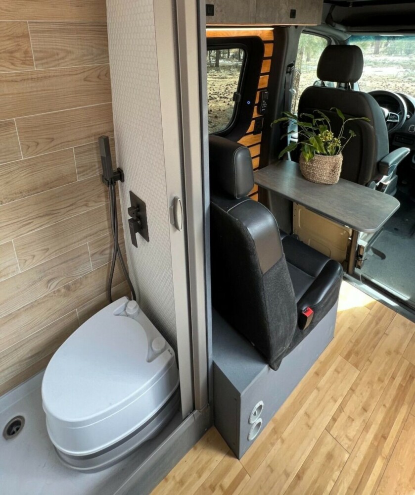 this luxurious big bear vans camper conversion has an elevator bed and rooftop decking 11