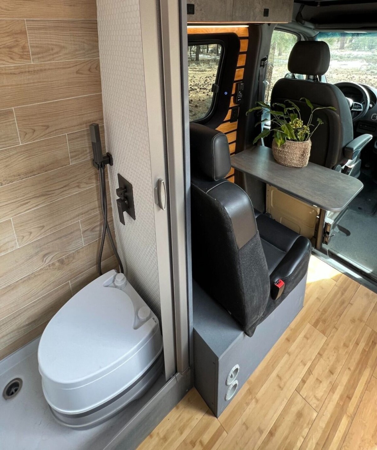 this luxurious big bear vans camper conversion has an elevator bed and rooftop decking 11