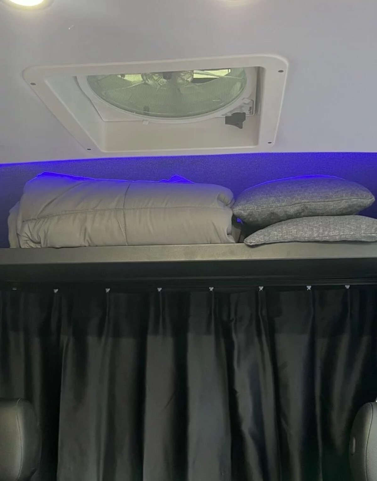 this luxurious big bear vans camper conversion has an elevator bed and rooftop decking 6