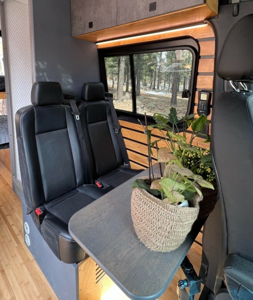 this luxurious big bear vans camper conversion has an elevator bed and rooftop decking 9