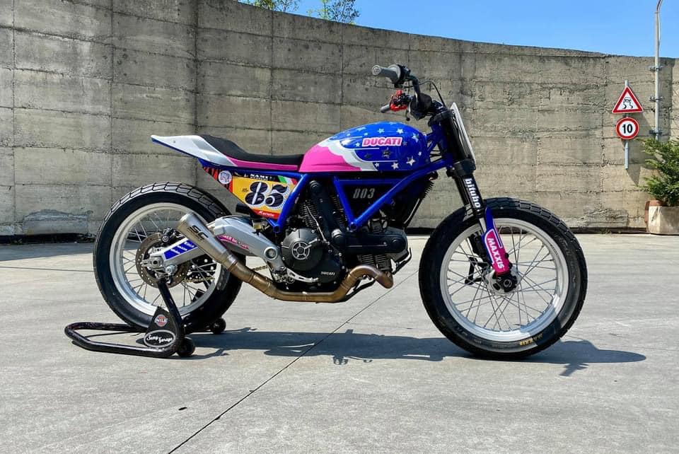 this modified ducati scrambler is a race ready flat tracker dressed in playful livery 223570 1