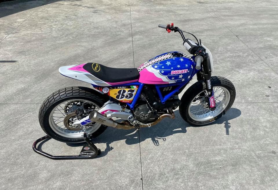 this modified ducati scrambler is a race ready flat tracker dressed in playful livery 10