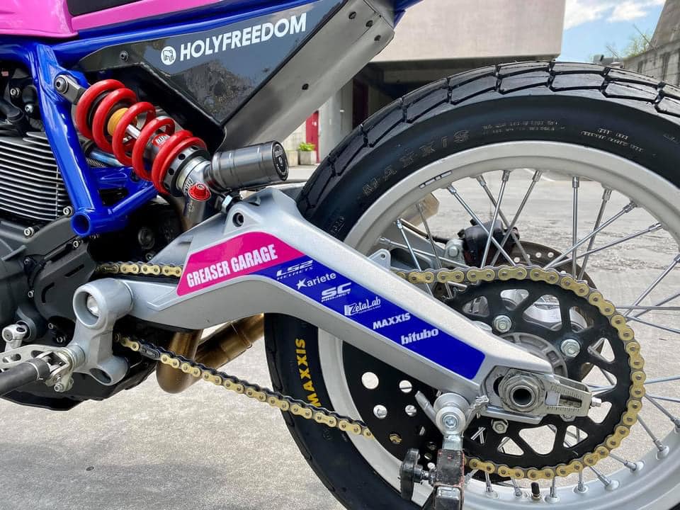 this modified ducati scrambler is a race ready flat tracker dressed in playful livery 11