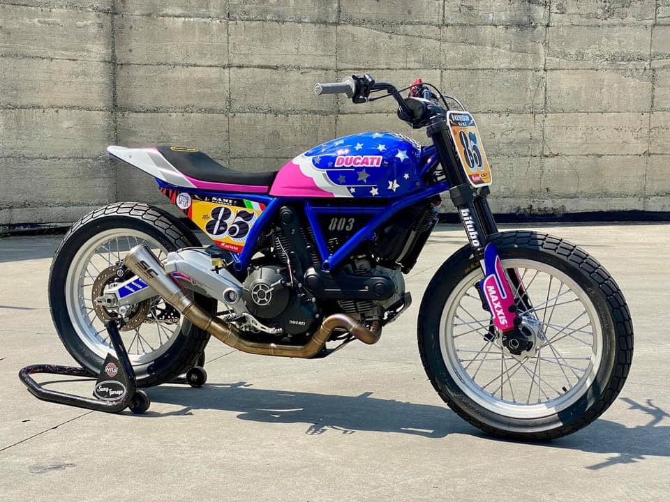 this modified ducati scrambler is a race ready flat tracker dressed in playful livery 12
