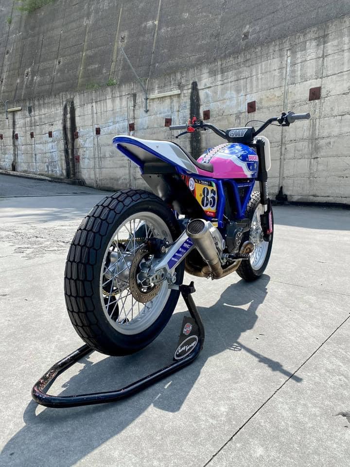 this modified ducati scrambler is a race ready flat tracker dressed in playful livery 5