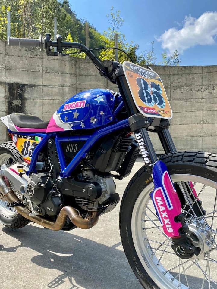 this modified ducati scrambler is a race ready flat tracker dressed in playful livery 6
