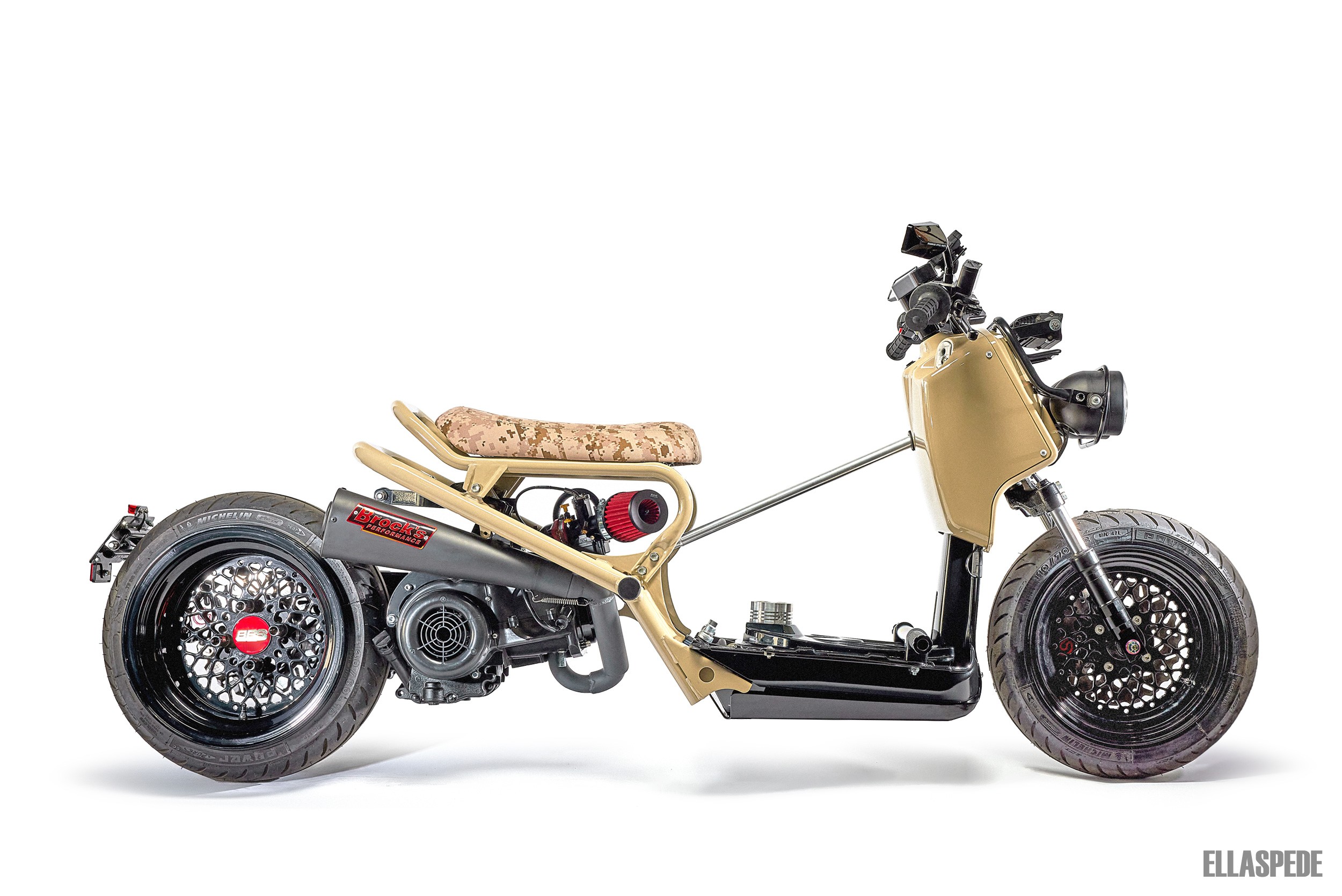 this zany custom honda ruckus is stretched slammed and adorably impractical 1